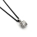 0.50ct lab diamond pendant in 14kt white gold on a black chain, white background