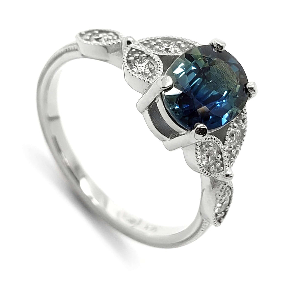14K white gold ring with oval blue Australian sapphire and Canadian diamond accents