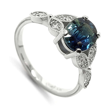 14K white gold ring with oval blue Australian sapphire and Canadian diamond accents