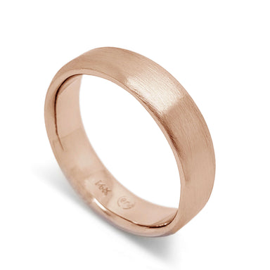 14k rose gold flat wedding ring with brushed finish and rolled edge