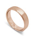 14k rose gold flat wedding ring with brushed finish and rolled edge