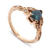 14k rose gold ring with pear-shaped teal sapphire and leaf-set Canadian diamonds