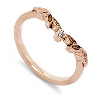 14k rose gold wedding ring with leaf motif and bezel-set Canadian diamond
