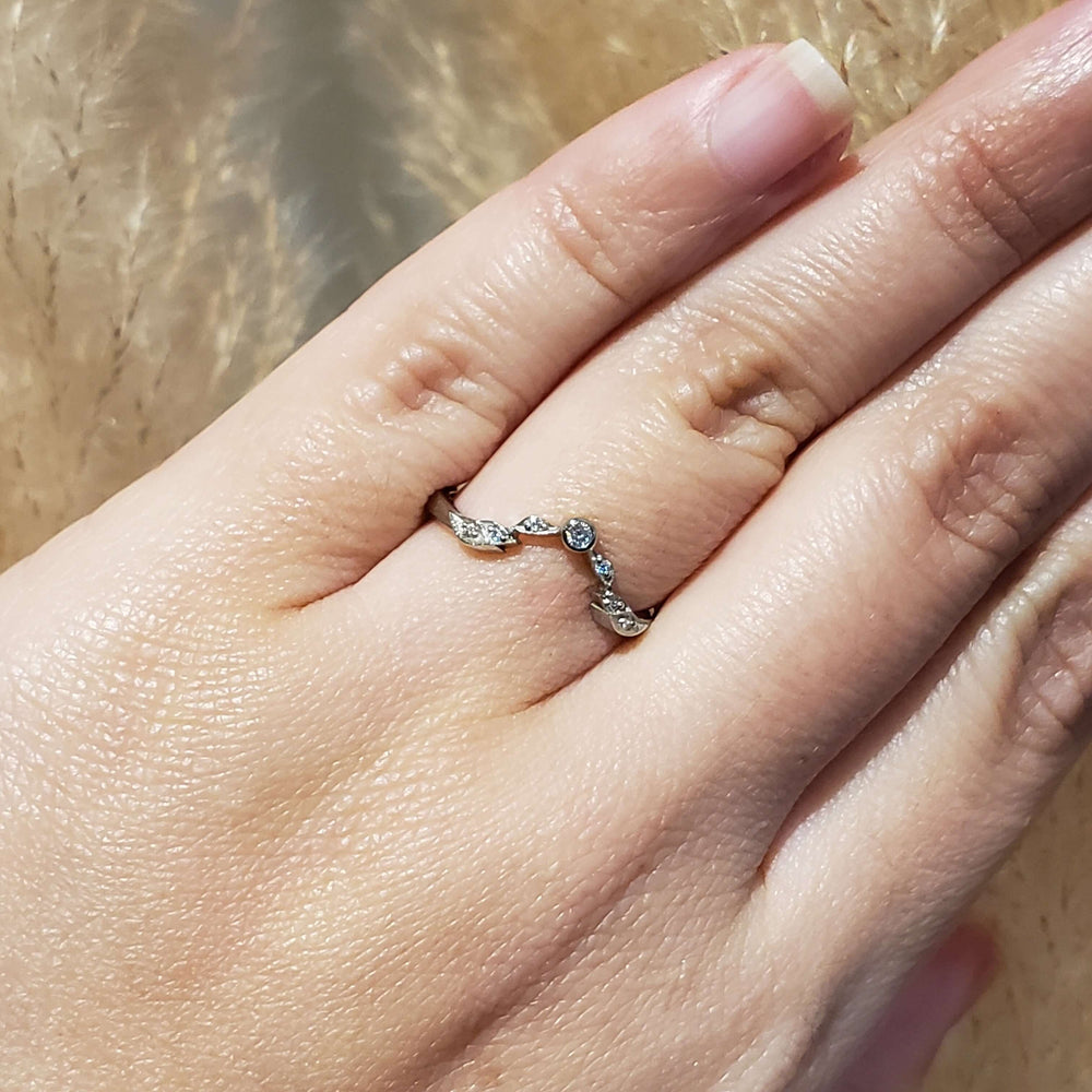 14k white gold lab diamond leaf wedding ring shown on a hand