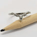 14k white gold leafy wedding ring with Canadian diamonds shown with pencil for scale