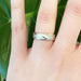 14k white gold topography textured wedding ring worn on hand