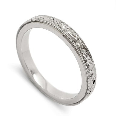14k white gold wedding ring with hand engraving and millgrain detail