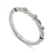 14k white gold wedding ring with textured leaf details and bezel set Canadian diamonds