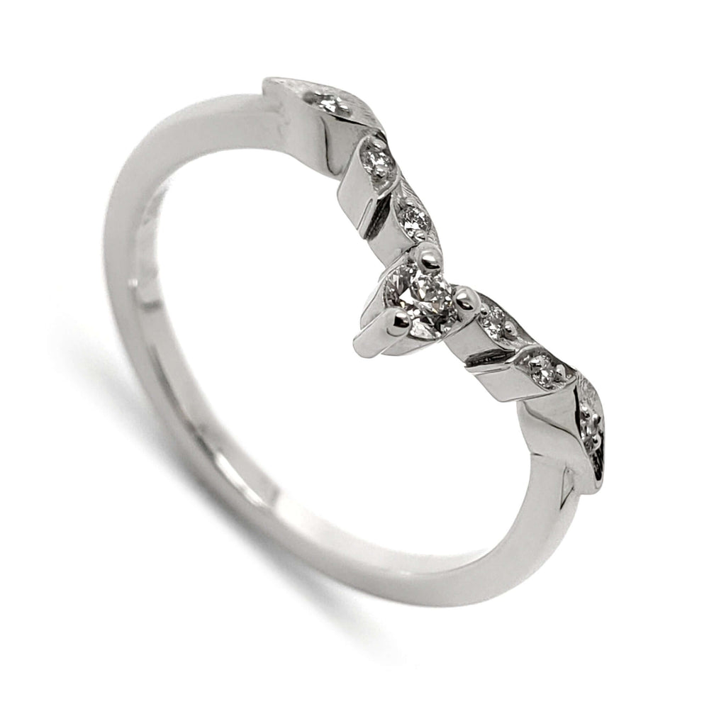 14k white gold wedding ring with leaf motif and Canadian diamonds, angled view