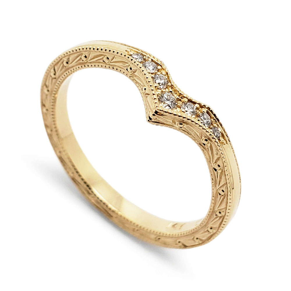 Chevron wedding band in 14k yellow gold with pave-set Canadian diamonds and engraved details
