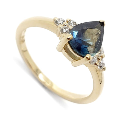 14k yellow gold ring with pear-cut blue Australian sapphire and Canadian diamonds, close up