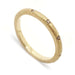 14k yellow gold wedding band with flush-set champagne diamonds and saw blade texture