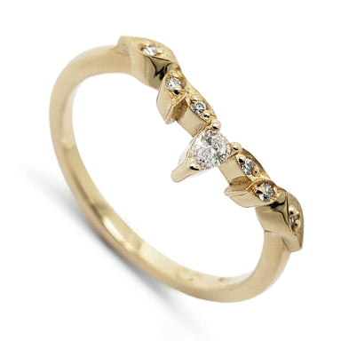14k yellow gold wedding ring with pear cut diamond and leaf details