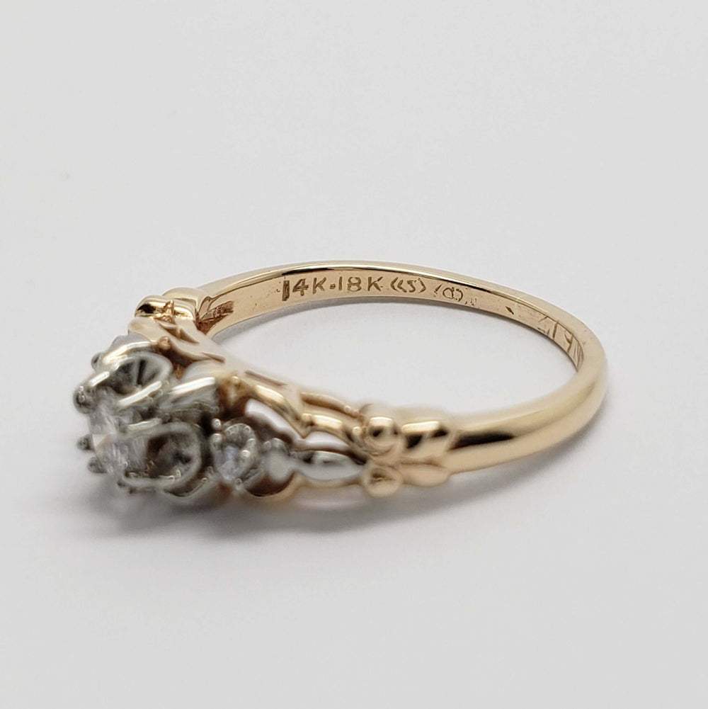Hallmark detail of 14kt and 18kt gold on antique diamond ring band