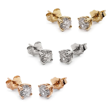 Three pairs of 14kt gold lab diamond stud earrings in yellow, white, and rose gold