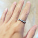 14kt palladium white gold wedding ring worn on hand, high polish finish