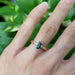 14kt rose gold and Australian sapphire engagement ring worn on hand
