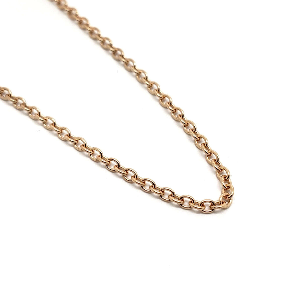 Close-up of handcrafted 14kt rose gold cable chain links