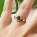 14kt rose gold chevron wedding band stacked with engagement ring and band on hand