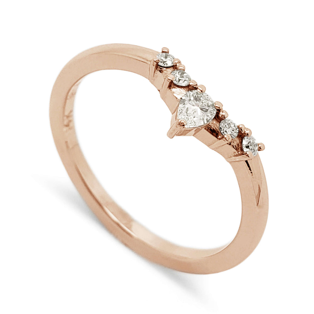 14kt rose gold chevron wedding ring with pear cut diamond and round accent diamonds