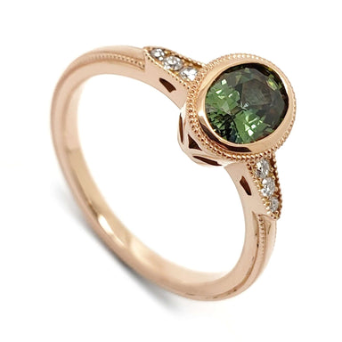 14kt rose gold engagement ring with bezel-set oval green sapphire and diamond accents