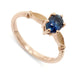 14kt rose gold engagement ring with oval blue Montana sapphire and leaf details