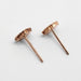 Back view of 14kt rose gold floral stud earrings showing earring posts