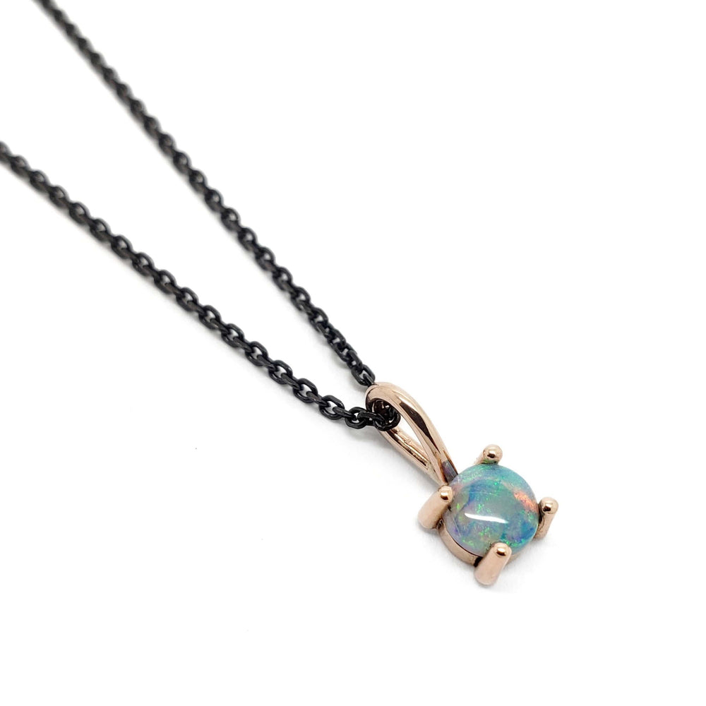 14kt rose gold pendant with round opal on black chain, handcrafted by Era Design