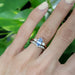 14kt rose gold purple sapphire and lab diamond ring stacked with diamond chevron band on hand