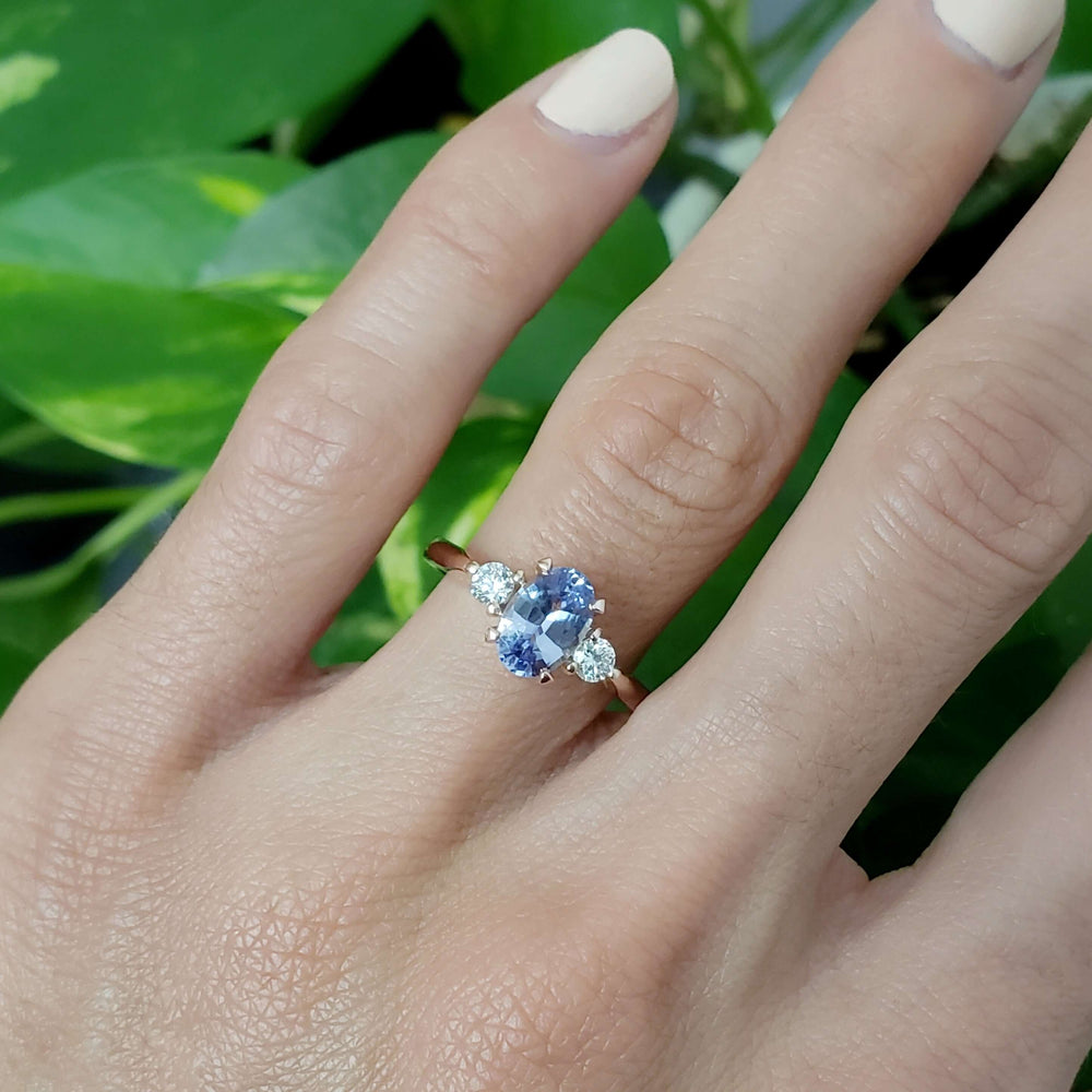14kt rose gold purple sapphire and lab diamond ring worn on hand