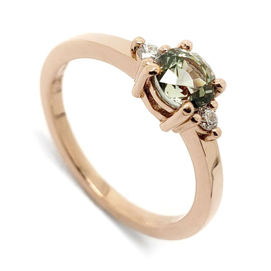 14kt rose gold ring with round green Australian sapphire and two Canadian diamonds