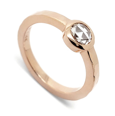 14kt rose gold ring with bezel set rose cut diamond and hammered band