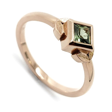 14kt rose gold ring with princess cut green lab-grown sapphire and leaf details