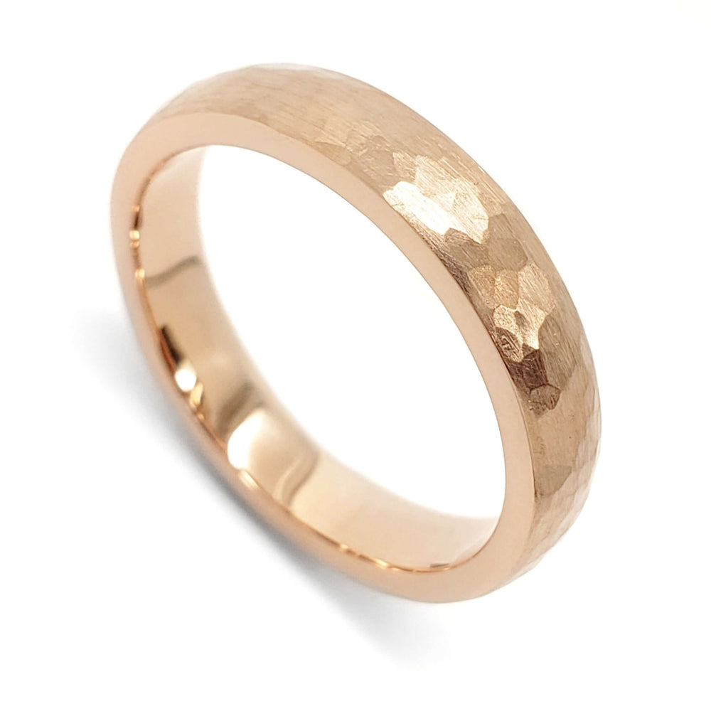 14kt rose gold wedding ring with hammered and brushed texture on white background