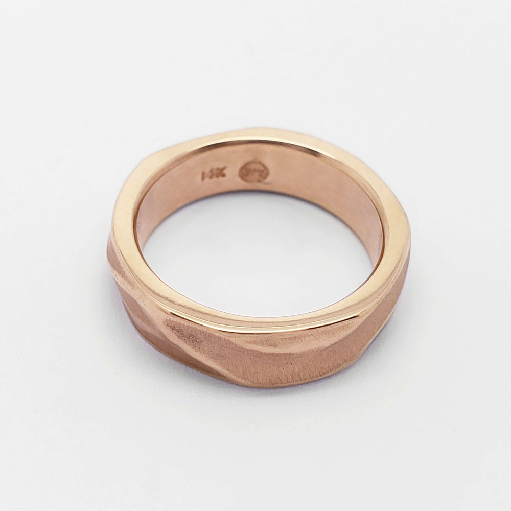 14kt rose gold wedding ring with handcarved topography design, top view