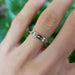 14kt white gold Art Deco wedding ring with Canadian diamonds, worn on a hand
