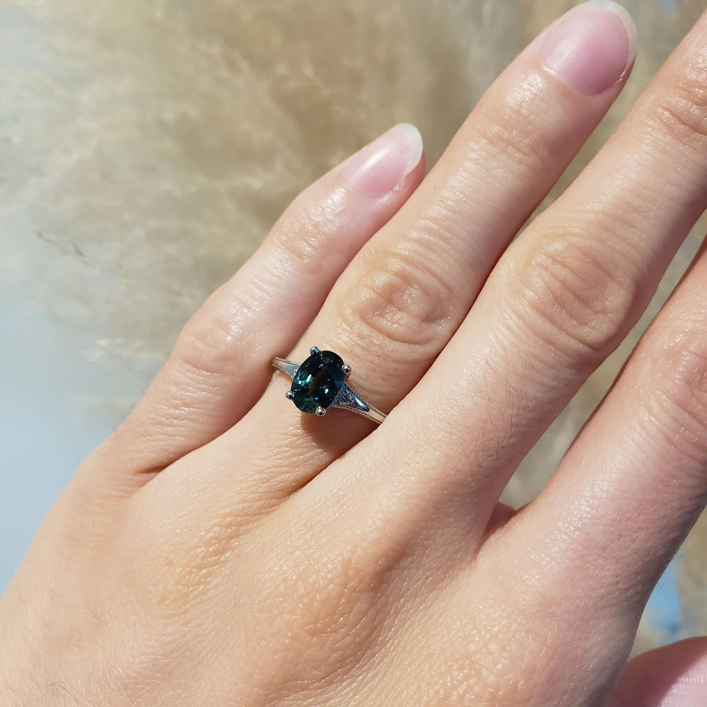 14kt white gold Australian sapphire and diamond ring shown on hand