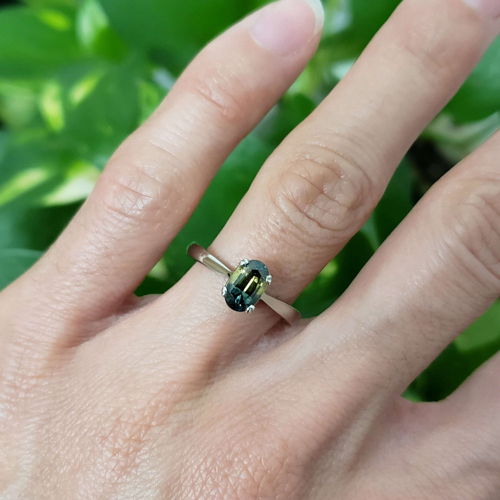 14kt white gold Australian sapphire ring worn on a hand