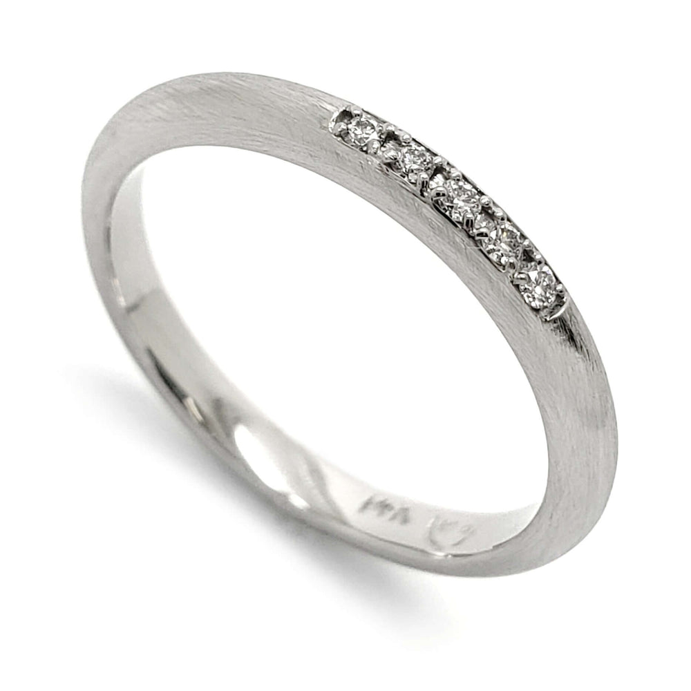 14kt white gold wedding ring with a row of Canadian diamonds and brushed finish