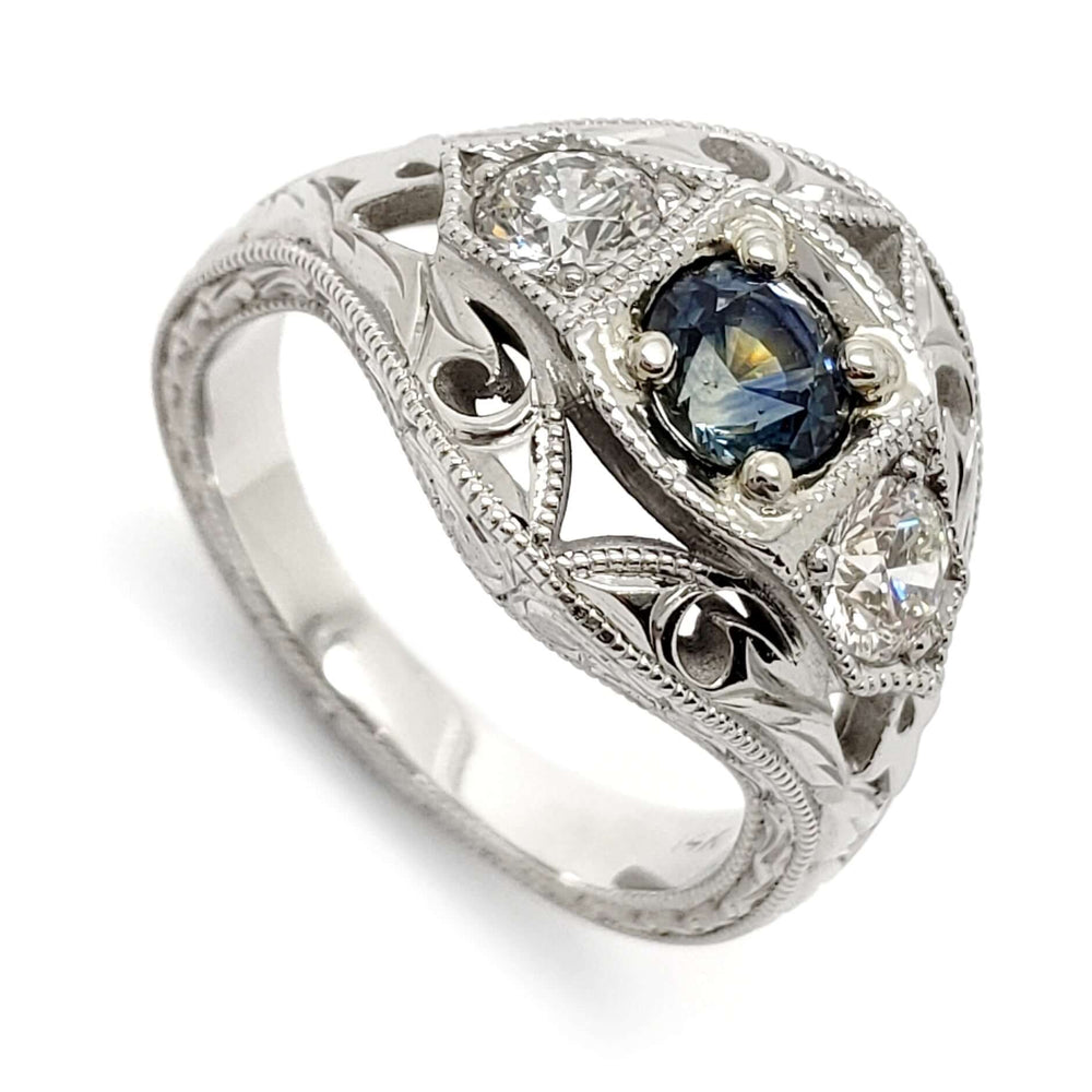 Art Deco-inspired 14kt white gold ring with blue Montana sapphire and two Canadian diamonds