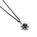 14kt white gold star-shaped pendant with blue Montana sapphire and lab diamonds on chain
