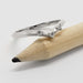 14kt white gold chevron wedding ring with three diamonds, displayed on pencil