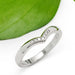 14kt white gold chevron diamond wedding ring with pavé setting, leaf background