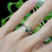14kt white gold chevron millgrain wedding band stacked with a marquise diamond ring