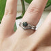 14kt white gold chevron millgrain wedding band stacked with a sapphire and diamond ring