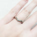 14kt white gold chevron pavé diamond wedding ring worn on hand