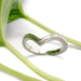 14kt white gold chevron wedding ring with millgrain, displayed on green plant