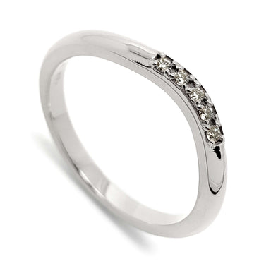 14kt white gold chevron wedding ring with pave set Canadian diamonds
