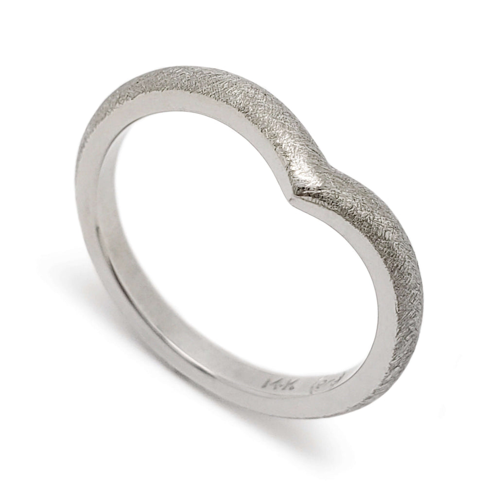 14kt white gold chevron wedding ring with saw blade texture, angled view