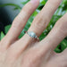 14kt white gold diamond engagement ring worn on a hand